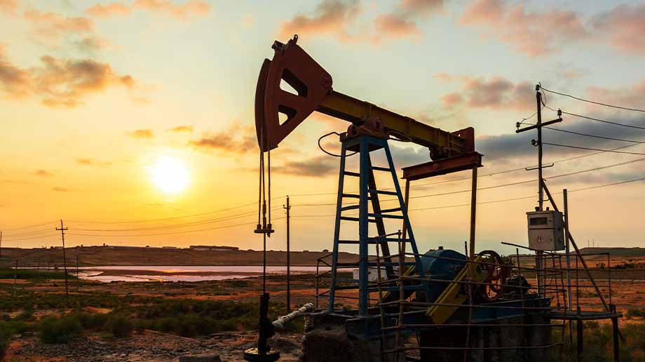 Oil pump silhouette at sunset