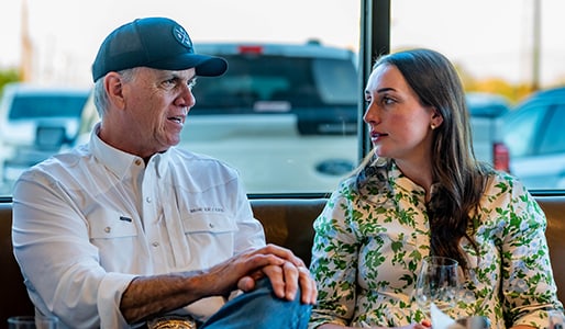 Oliva Gibbs professional in conversation with client