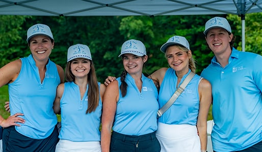 Group of Oliva Gibbs team members at a golf outing