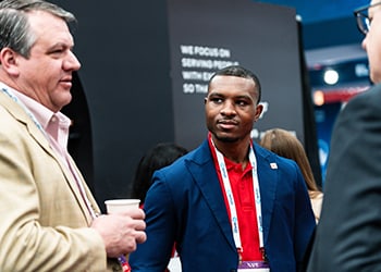 Oliva Gibbs team members networking at NAPE Summit