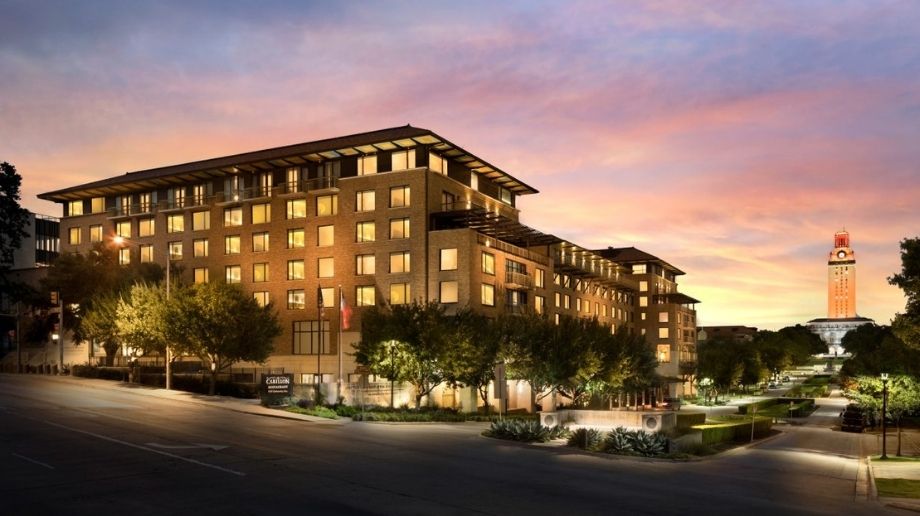 Exterior of AT&T Hotel and Conference Center in Austin, TX at dusk