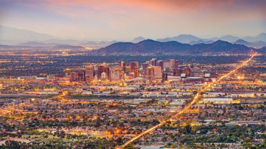 Aerial view of Phoenix skyline and surrounding suburbs at dusk