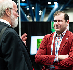 Two men networking at NAPE Expo